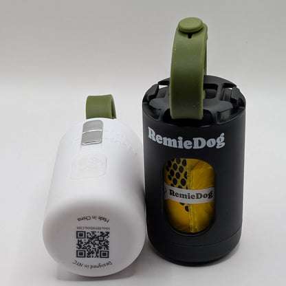 black and white remiedog poop bag holder with green straps next to each other