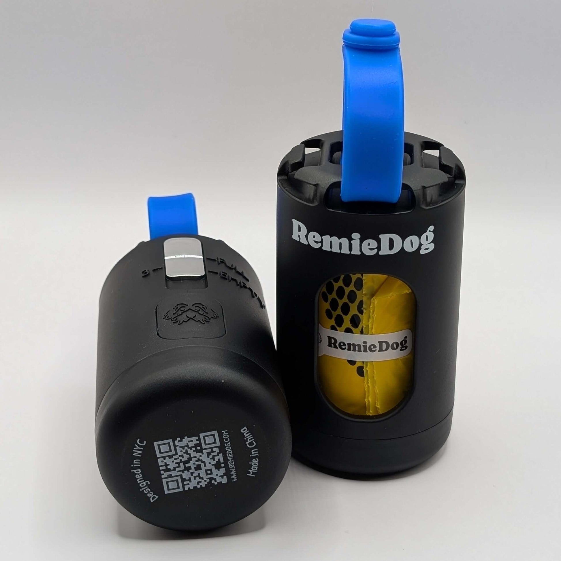 Two black dog poop bag holders with blue strap with RemieDog branding
