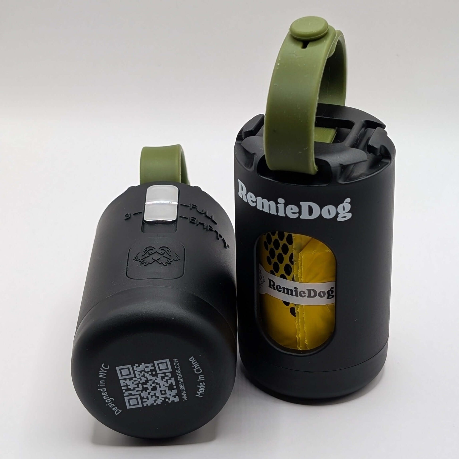 Two black dog poop bag holders with green strap with RemieDog branding