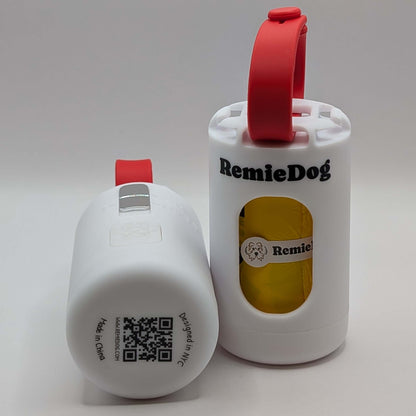 Two white dog poop bag holders with red strap with RemieDog branding